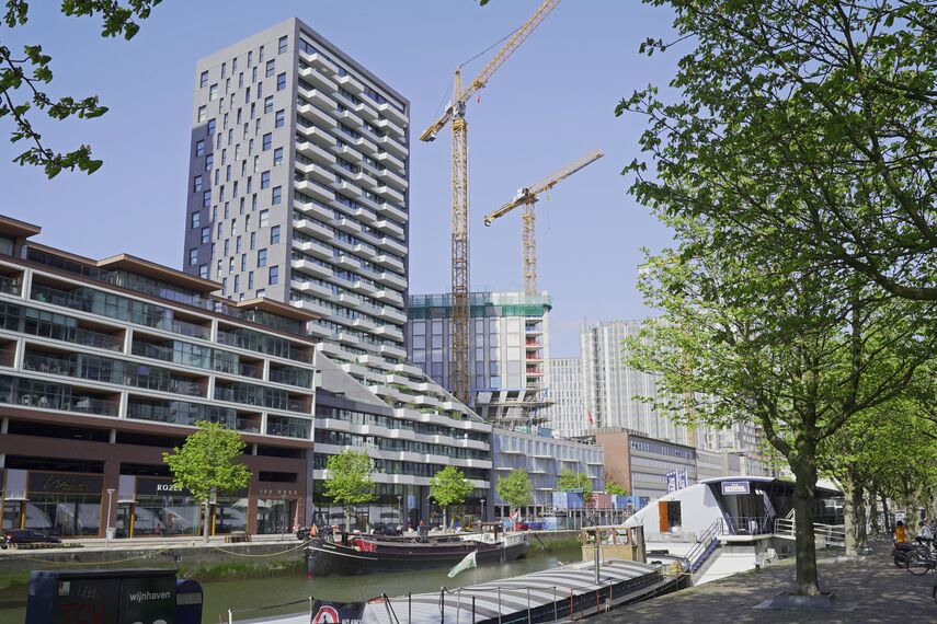 ConceptSystem 77 Ramen, ConceptWall 50 Vliesgevels en ConceptPatio 130 Schuifsystemen - Appartementencomplex The Muse: geeft Rotterdamse skyline smoel gelegen in Rotterdam, Nederland
