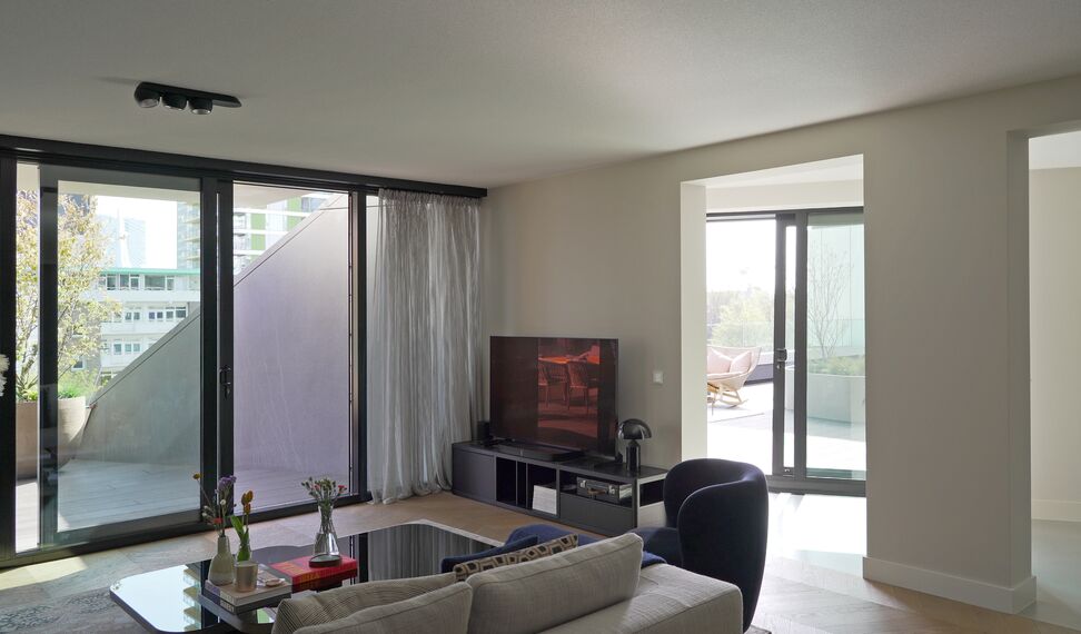 ConceptSystem 77 Ramen, ConceptWall 50 Vliesgevels en ConceptPatio 130 Schuifsystemen - Appartementencomplex The Muse: geeft Rotterdamse skyline smoel gelegen in Rotterdam, Nederland