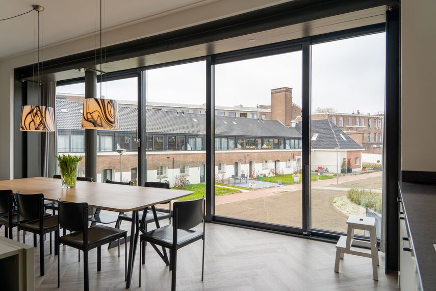ConceptPatio 130 Schuifsystemen, ConceptSystem 77 Ramen en SlimLine 38 Deuren - Appartementencomplex Tuin van Noord: van gevangenis naar luxe woningen gelegen in Rotterdam, Nederland