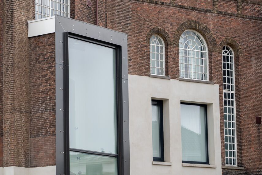 ConceptPatio 130 Schuifsystemen, ConceptSystem 77 Ramen en SlimLine 38 Deuren - Appartementencomplex Tuin van Noord: van gevangenis naar luxe woningen gelegen in Rotterdam, Nederland