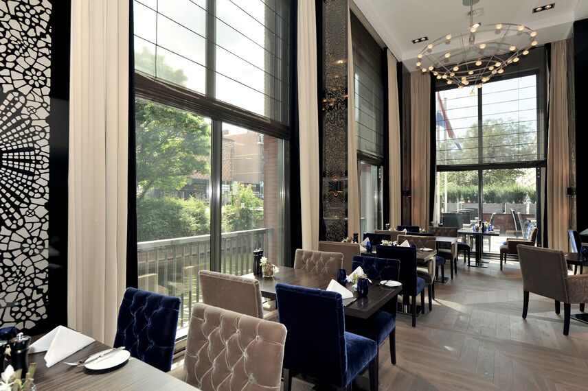ConceptWall 50 Vliesgevels - Hilton hotel gelegen in Den Haag, Nederland