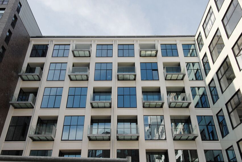 CS 38-SL Geannuleerde systemen en SlimLine 38 Ramen - Appartementencomplex Philips Lichttoren: transformatie van staal naar aluminium kozijnen gelegen in Eindhoven, Nederland