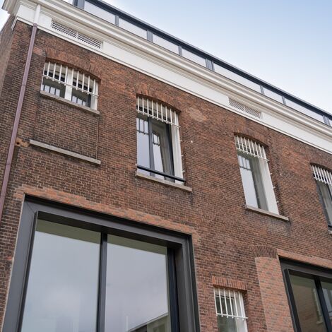 ConceptPatio 130 Schuifsystemen, ConceptSystem 77 Ramen en SlimLine 38 Deuren - Appartementencomplex Tuin van Noord: van gevangenis naar luxe woningen gelegen in Rotterdam, Nederland