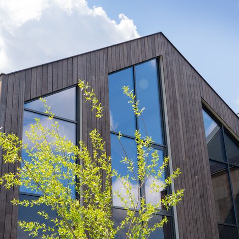 ConceptWall 50 Vliesgevels en ConceptSystem 77 Ramen - School IKC Grebbe: gericht puzzelen naar verbinding, rust en transparantie gelegen in Tilburg, Nederland