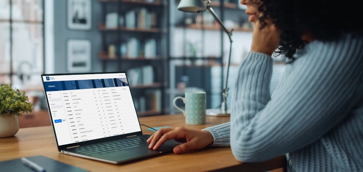 Woman searching the Order portal on her laptop.