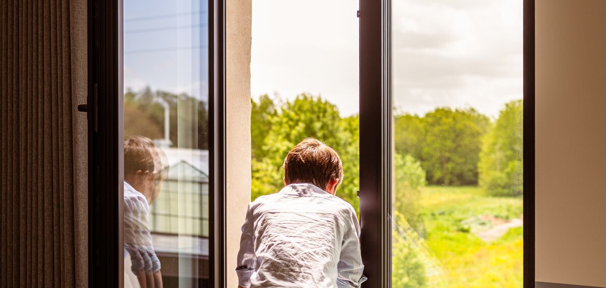 child looking out the window