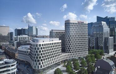 ConceptWall 50 Vliesgevels, ConceptWall 86 Vliesgevels, CW 86 Standard Vliesgevels en CW 86-EF Vliesgevels - Quatuor: een kwartet van gebouwen met duurzame oplossingen gelegen in Brussels, België